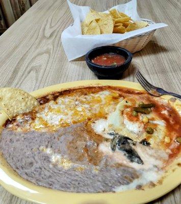 Cheese enchilada, chili relleno and beans..... So freaking yummy