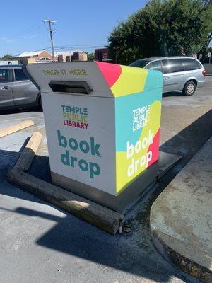 The book drop in the parking lot.