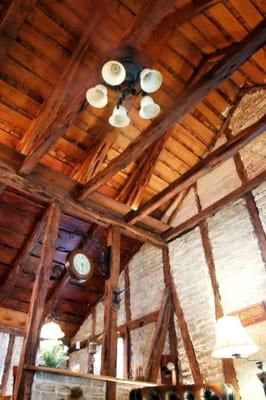 Reception area walls with unique fachwerk style brick, cedar posts, and beams.  A must see!!