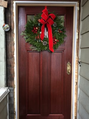 The wreath we got at Barclay's Tree Farm. I decorated it with other ornaments from previous years and it looks great!