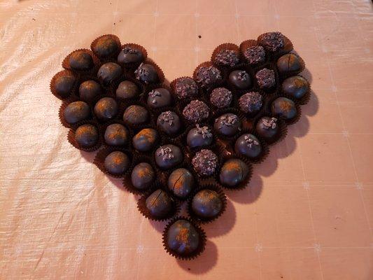 Organic dark chocolate truffles: A threesome of cayenne, cacao nibs & half n half (1/2 cayenne, 1/2 cacao nibs)