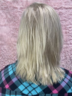 Platinum blonde color and haircut