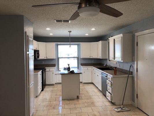 Kitchen remodel, new marble flooring, cabinet paint, wall paint, new tops, new recessed lighting, etc.