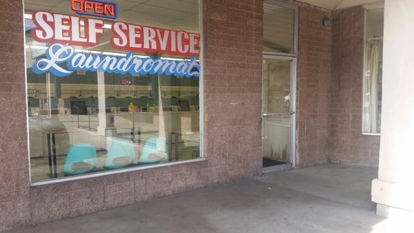 No big sign  laying laundromat.  But is across from dollar tree and big lots.