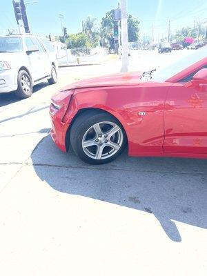 Someone backed into front right fender of my car.