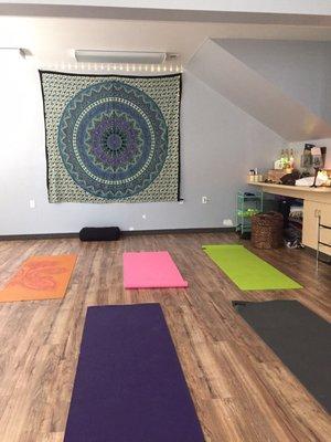 A few photos of the new yoga studio ! Come on in !