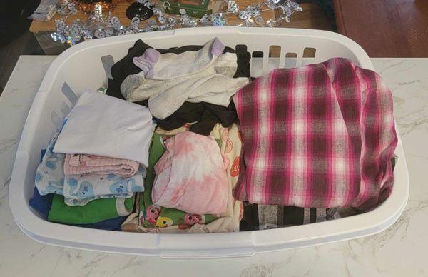 A basket of folded clean laundry