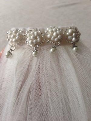 Gorgeous hand made veil embellishment hand made by Irina.