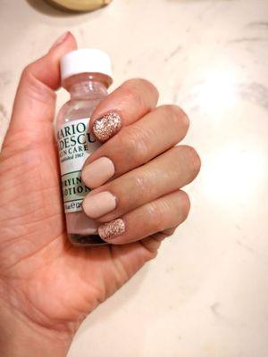 Nude gel Mani with glitter accent