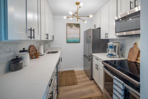 Everything remodeled from the counter tops, flooring to the ceiling light!