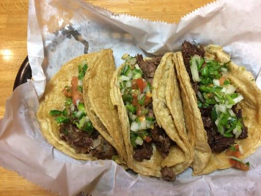 Three beef tacos: check, tongue, head.