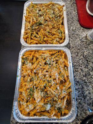 Pasta bolognese, big trays for catering.