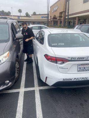 Vehicle as well as picture of employee who hit my car door in the banks parking lot.