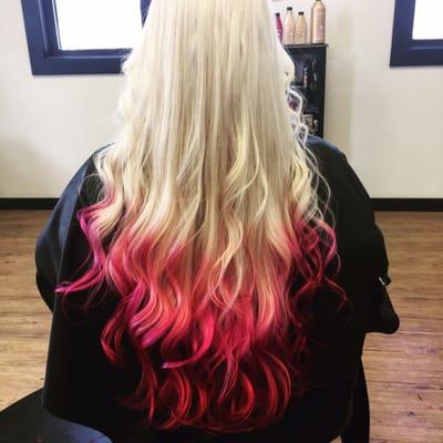 Platinum blonde with pink to red ombré