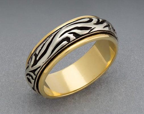 Men's ocean wave design in 18 karat yellow and white gold