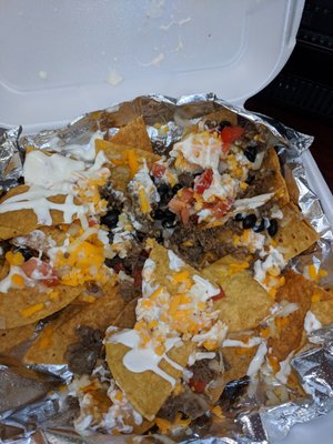 Steak nachos!! So delicious. Nachos are only $5 for a huge portion!