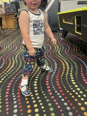 My 2 year blending in with the carpet and enjoying his first time bowling  Shoes Rental Shoes Rental Thunderbowl