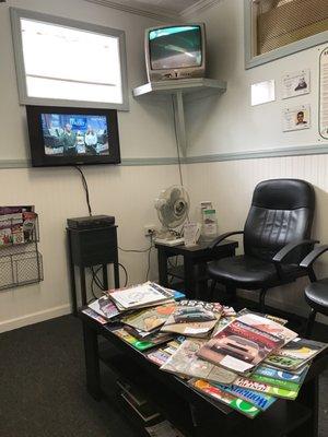 Here's the waiting area. I wasn't expecting to see a live camera feed of the workstation where my car would be. Huge props for that.