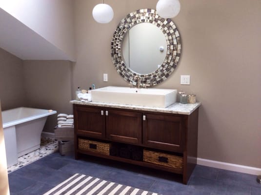 Custom vanity and barn doors complete bathroom remodeling