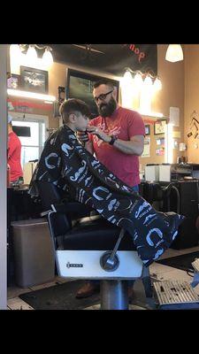 My boy gettin' his hair cut! They always do a great job!