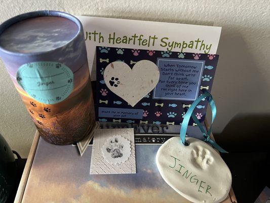 Her ashes, paw prints, seeds to plant and a card from the staff.