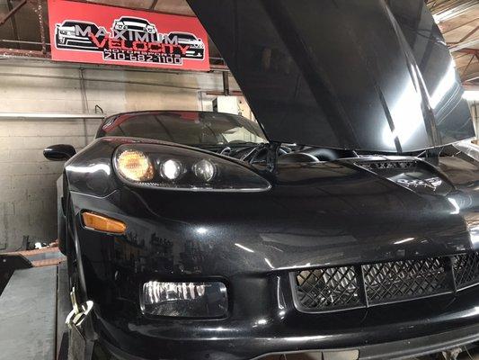 Corvette in the shop for tuning.