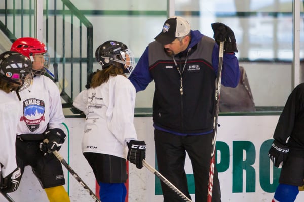 Coach Smitty giving feedback in McCall, ID. Bend the knees!