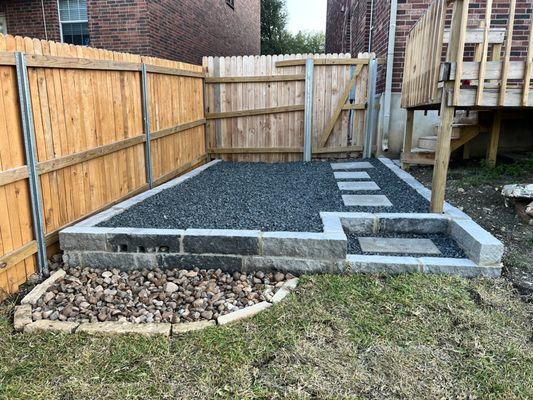 Retaining wall, rock landscaping and pavers