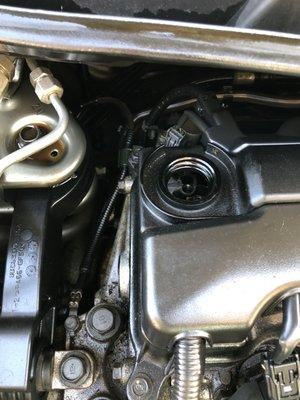 Missing oil cap.