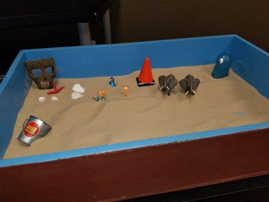 We offer Sand Tray therapy, which is a very beneficial form of therapy for young children.