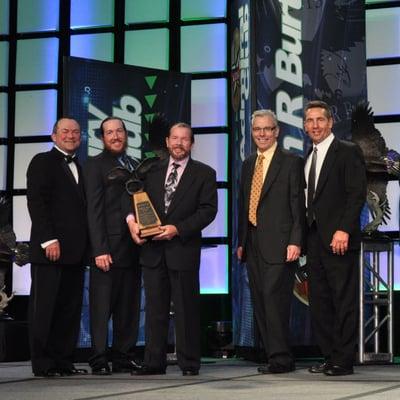 Superior Services RSH Inc receives the 2013 John R. Burt Award from Duro-Last Roofing for Outstanding Sales and Service.