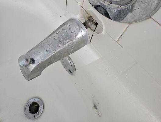 Original spout. There was no leak prior to work being performed. The spout had become dislodged from wall and needed to be replaced.