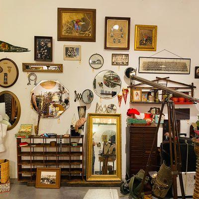 We carry original artwork by local artists and a variety of antique and vintage curios including a large selection of mirrors...