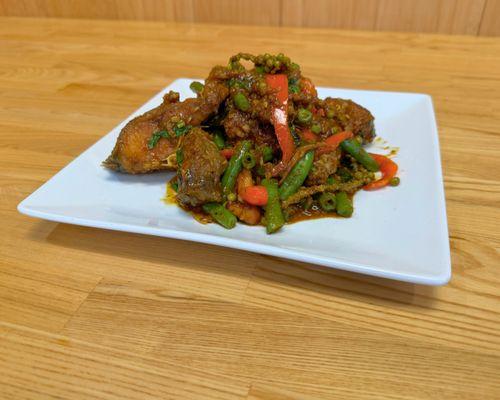 Southern Thai Style curry with deep-fried catfish steak.