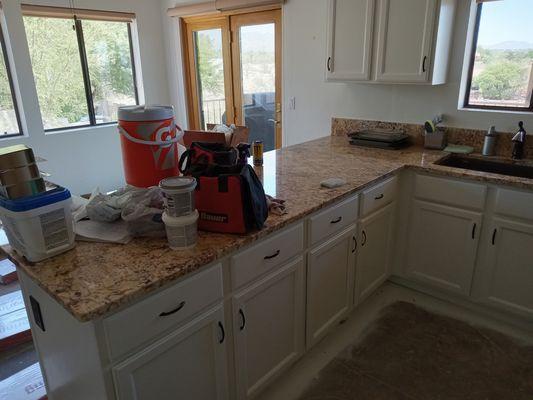 Refinished Kitchen Cabinets and handles