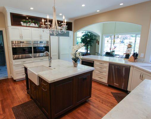 Stunning chandelier in transitional kitchen