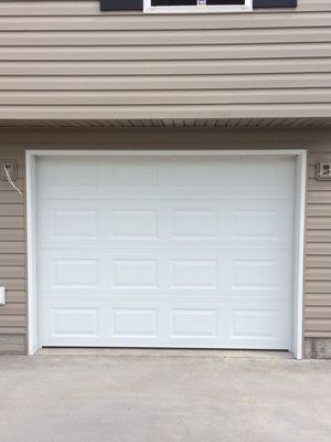 9'x7' Stratford 1000 solid door in new home construction.