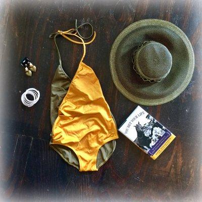 Whether you're relaxing by the pool or playing on the beach this brand new vintage Gucci bathing suit is sure to turn heads!!!