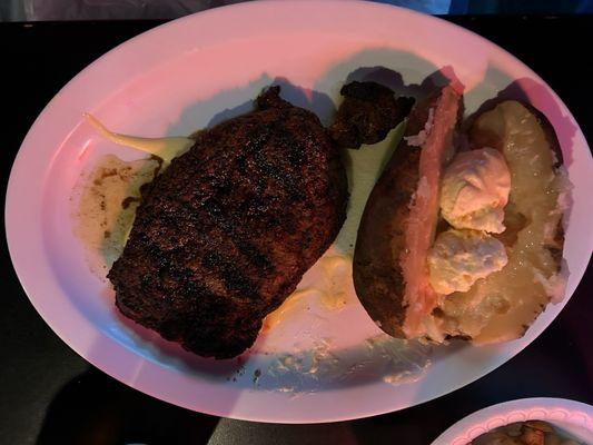 Ribeye steak with baked potato