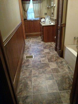 150 year old house bathroom. Vinyl floor is an in stock item. Plenty more Styles in stock.