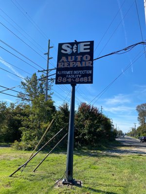 Auto shop street sign