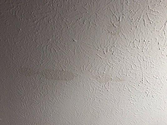 Water stains on ceiling above my bed, and I'm on the top floor