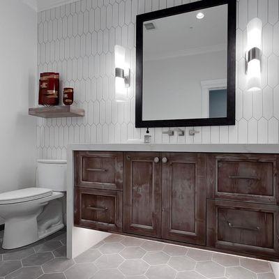 Enhanced lighting creates a welcoming atmosphere, perfect for unwinding in our newly renovated bathroom.