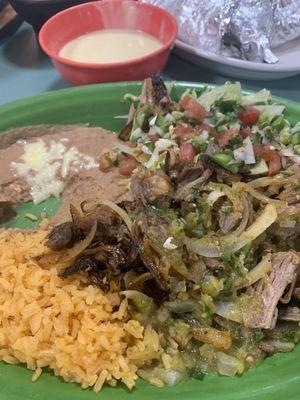 Carnitas Platter. The meat was tender, had good flavor. I prefer a more crispy edge from grill, this was more stew cooked.