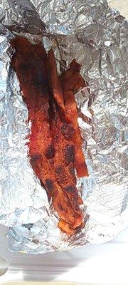 BACON BURNT TO A ROCK HARD CRISP.  DO NOT ORDER BACON WITH YOUR MEAL.