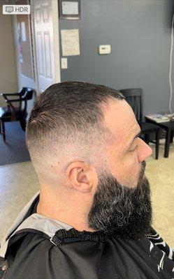 mid fade with beard trim and razor line