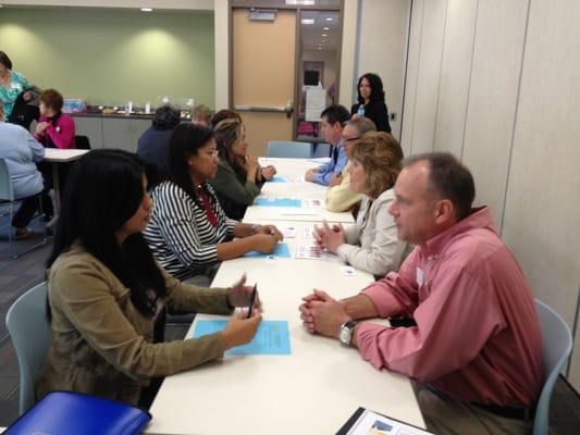 MAM clients engage in a "speed networking" exercise.