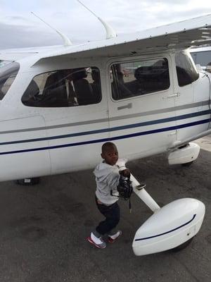 My son excited before his first airplane ride!