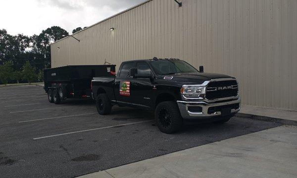 Our truck and trailer for hauling all debris.