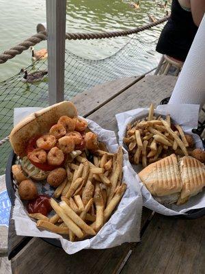 Shrimp Po'boy with fries and Cuban Panini with fries (the cuban did not have all the meats on it that the menu described)